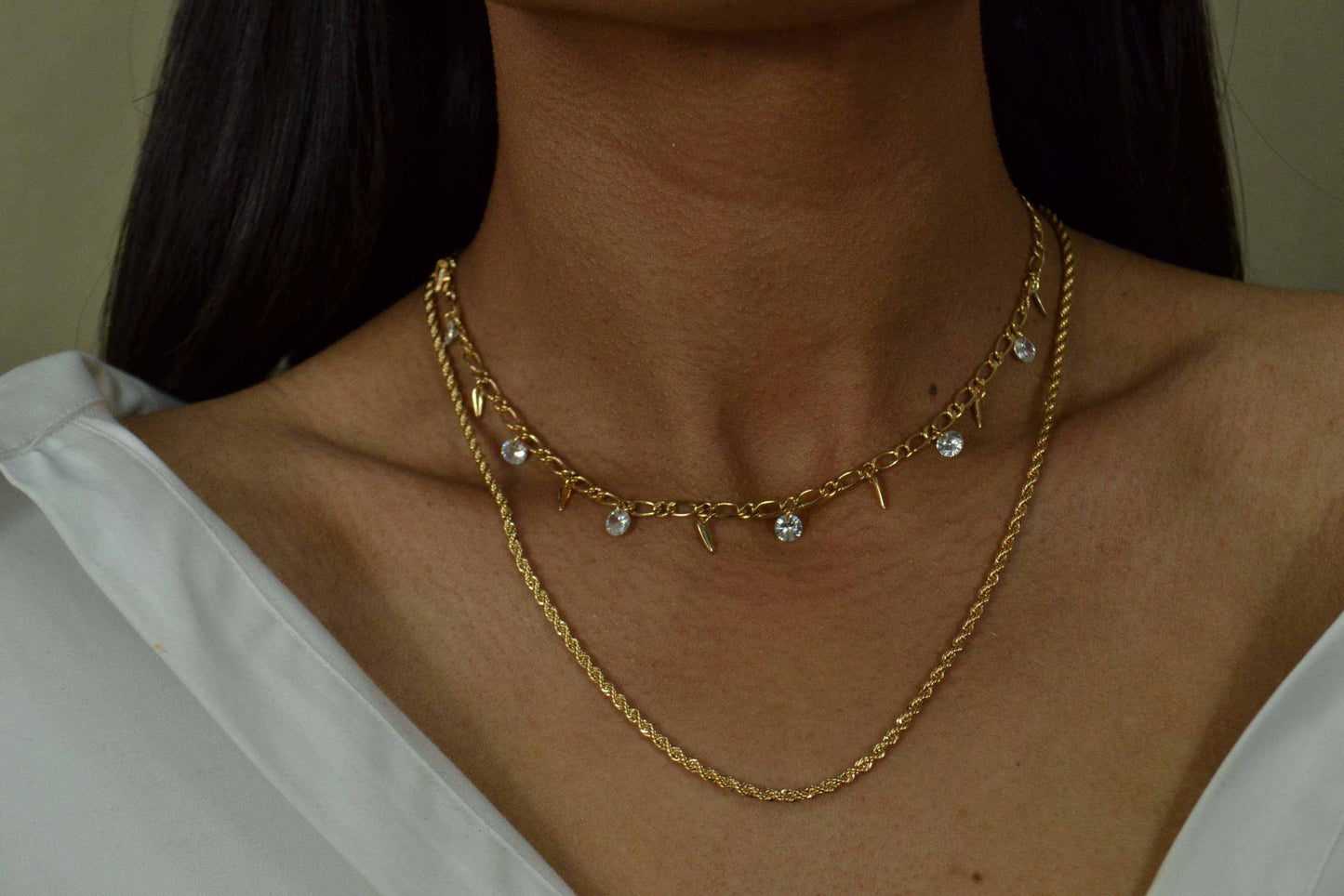 Angela necklace displayed on model
